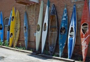 kayaks against the wall
